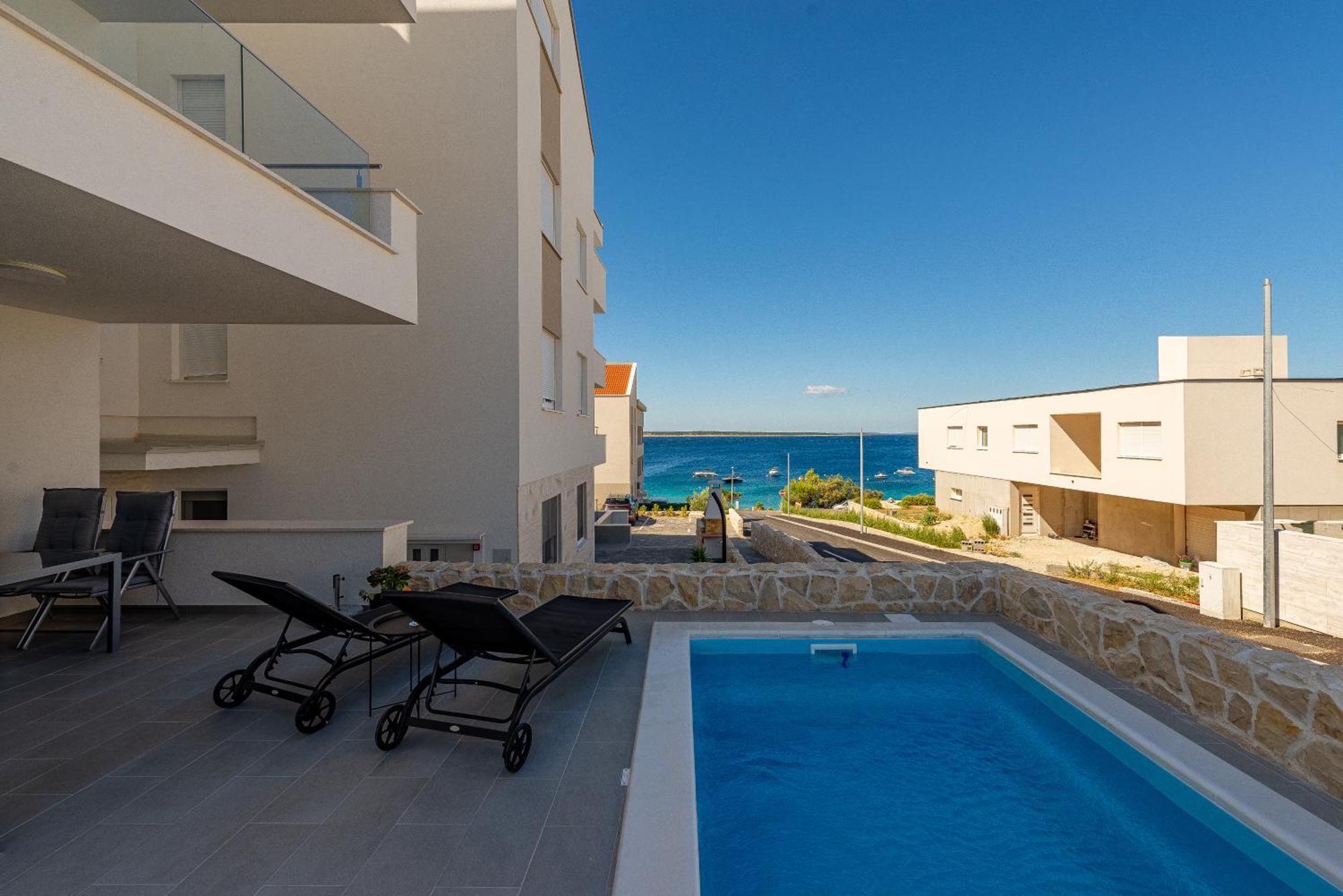Dolphin View With A Pool By The Apartment Mandre